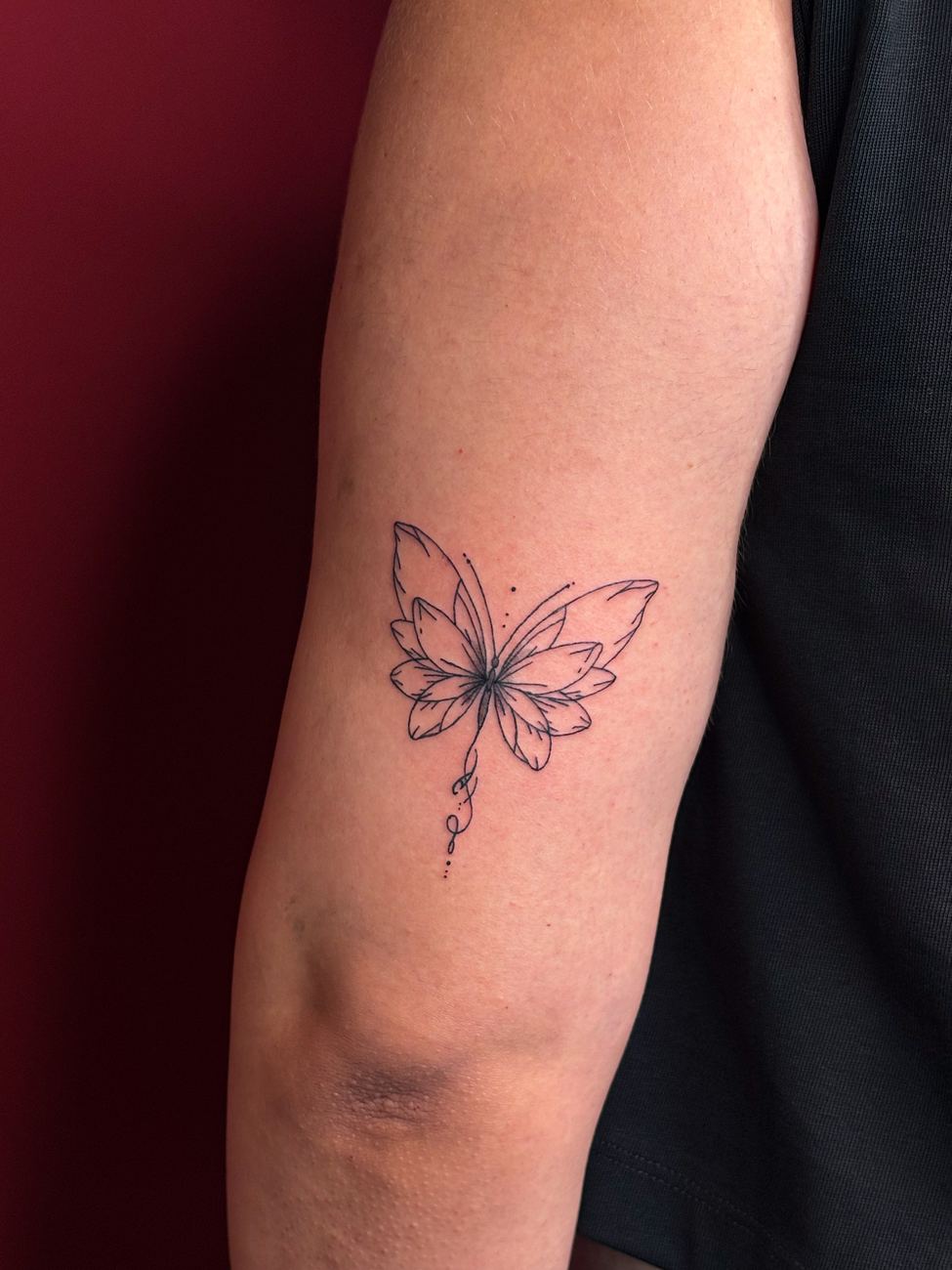 Tatuaje personalizado de una mariposa